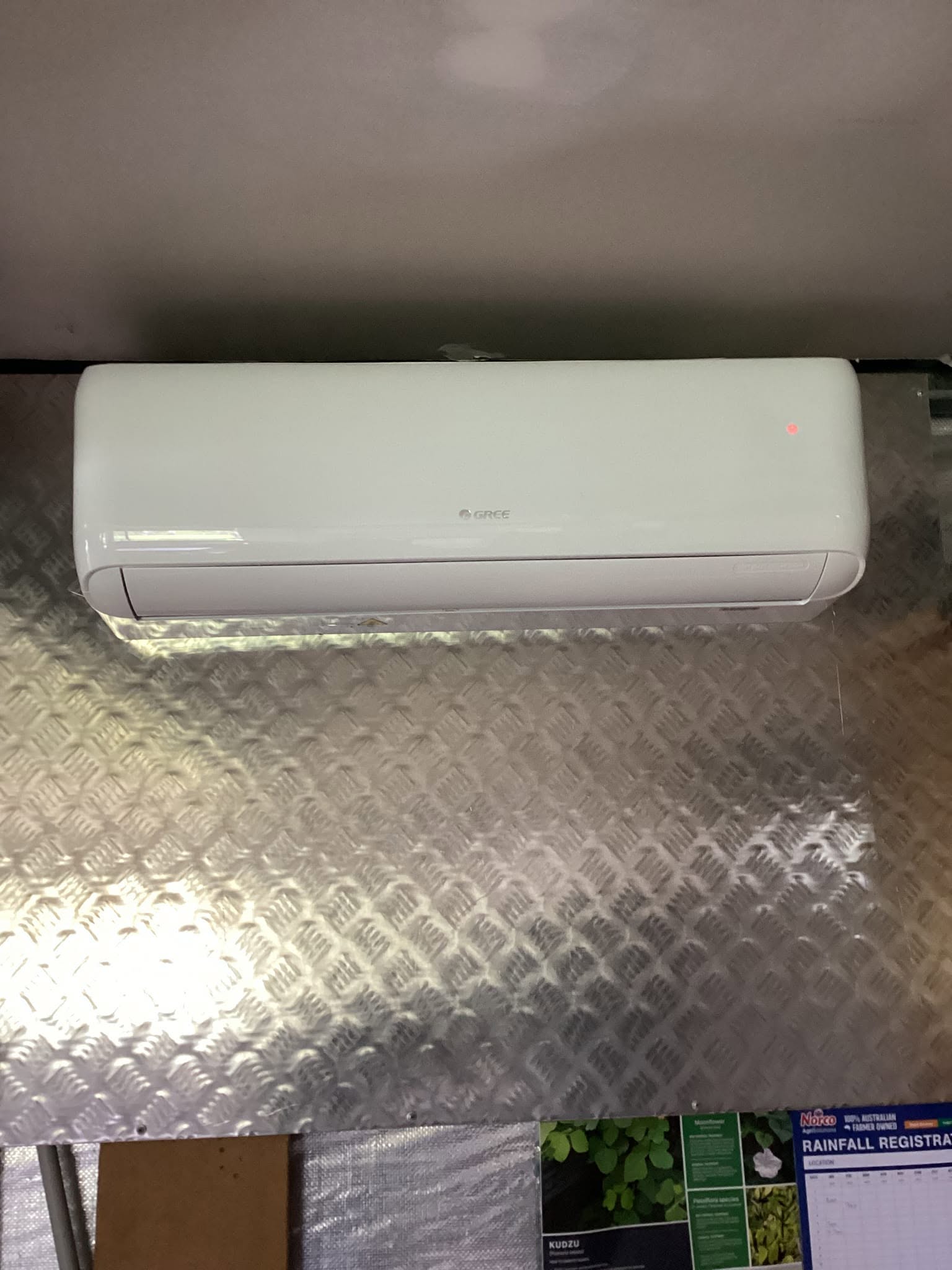 Gree split-system indoor unit installed in a shed interior